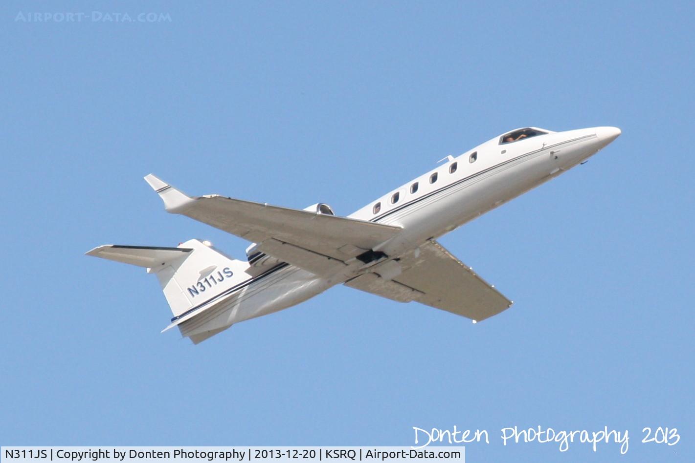 N311JS, 2000 Learjet 31A C/N 216, Learjet 31 (N311JS) departs Sarasota-Bradenton International Airport enroute to Chester County Airport