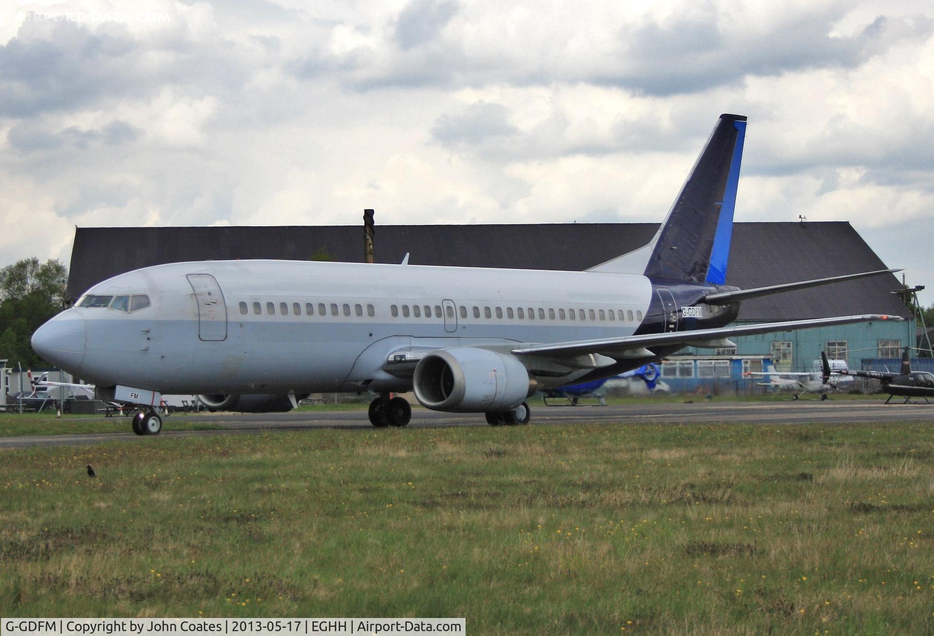 G-GDFM, 1998 Boeing 737-36N C/N 28586, Being towed to paintshop