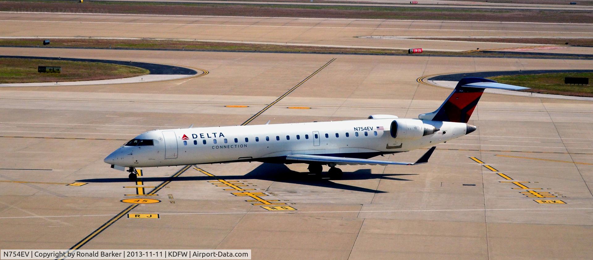 N754EV, 2004 Bombardier CRJ-701 (CL-600-2C10) Regional Jet C/N 10173, Taxi DFW