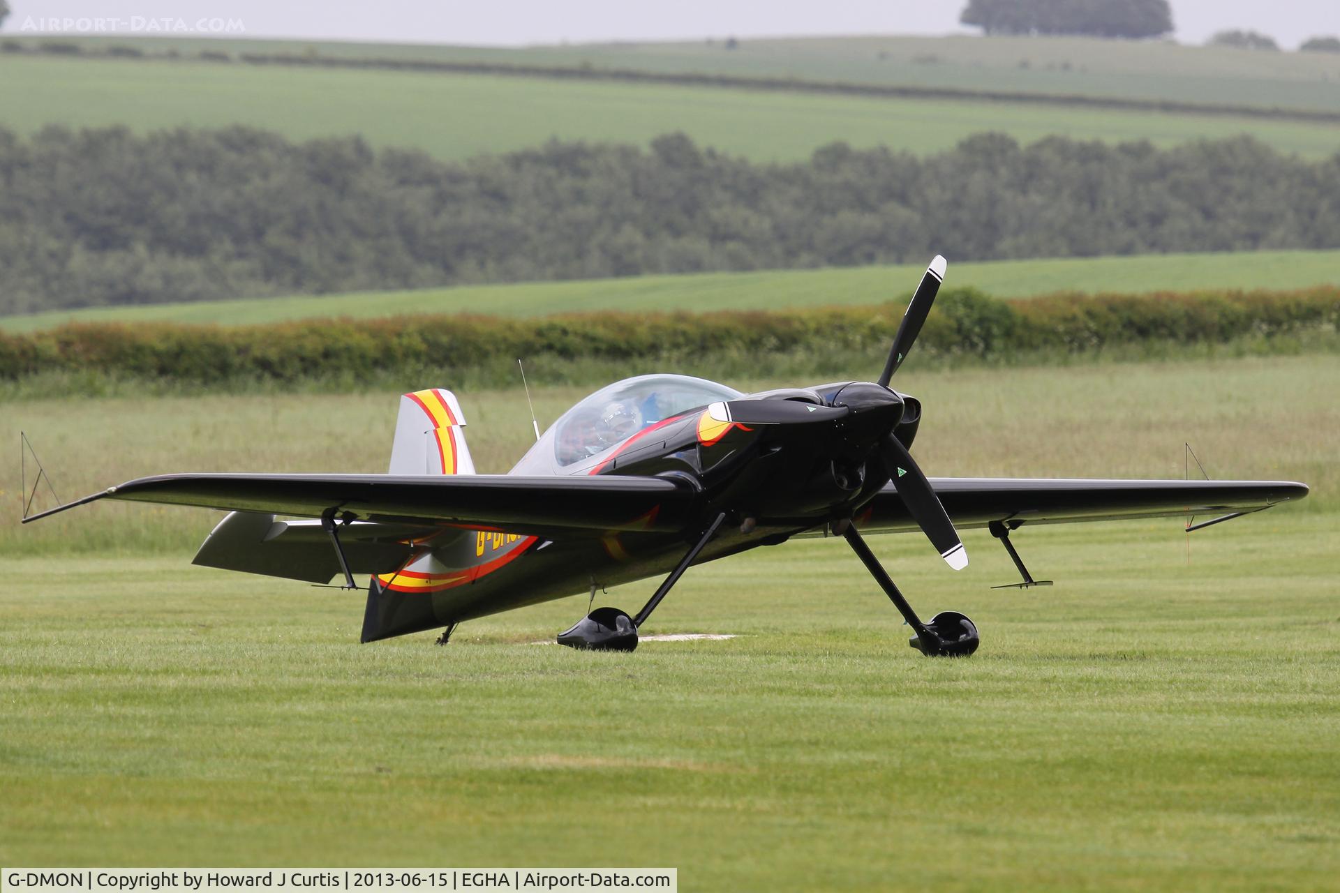 G-DMON, 2012 XtremeAir XA-42 Sbach 342 C/N 116, Privately owned, at the aerobatic competition here. Having landed with an engine problem, coasting to a halt with the engine shut down.