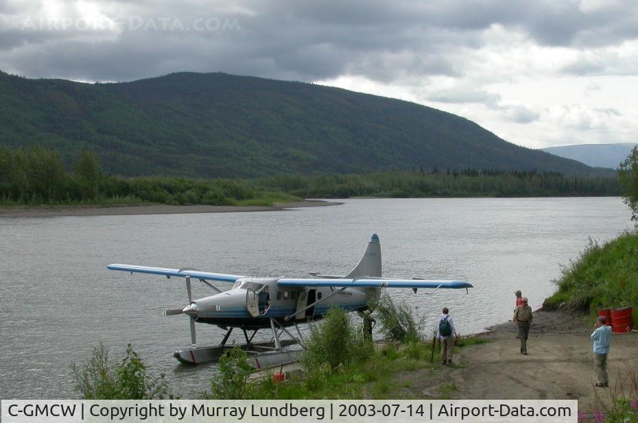 C-GMCW, 1956 De Havilland Canada DHC-3 Otter C/N 108, Loading along the Stewart River in the Yukon.