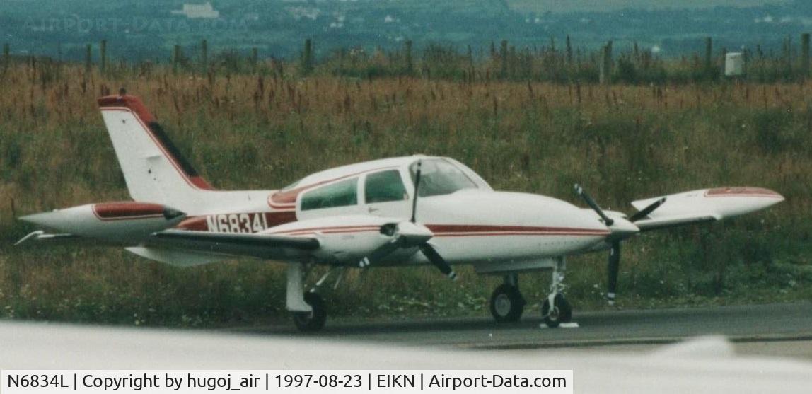 N6834L, Cessna T310R C/N 310R2137, Distant photo taken by myself on 23.08.1997 at Connaught-Knock Airport Co Mayo Ireland
