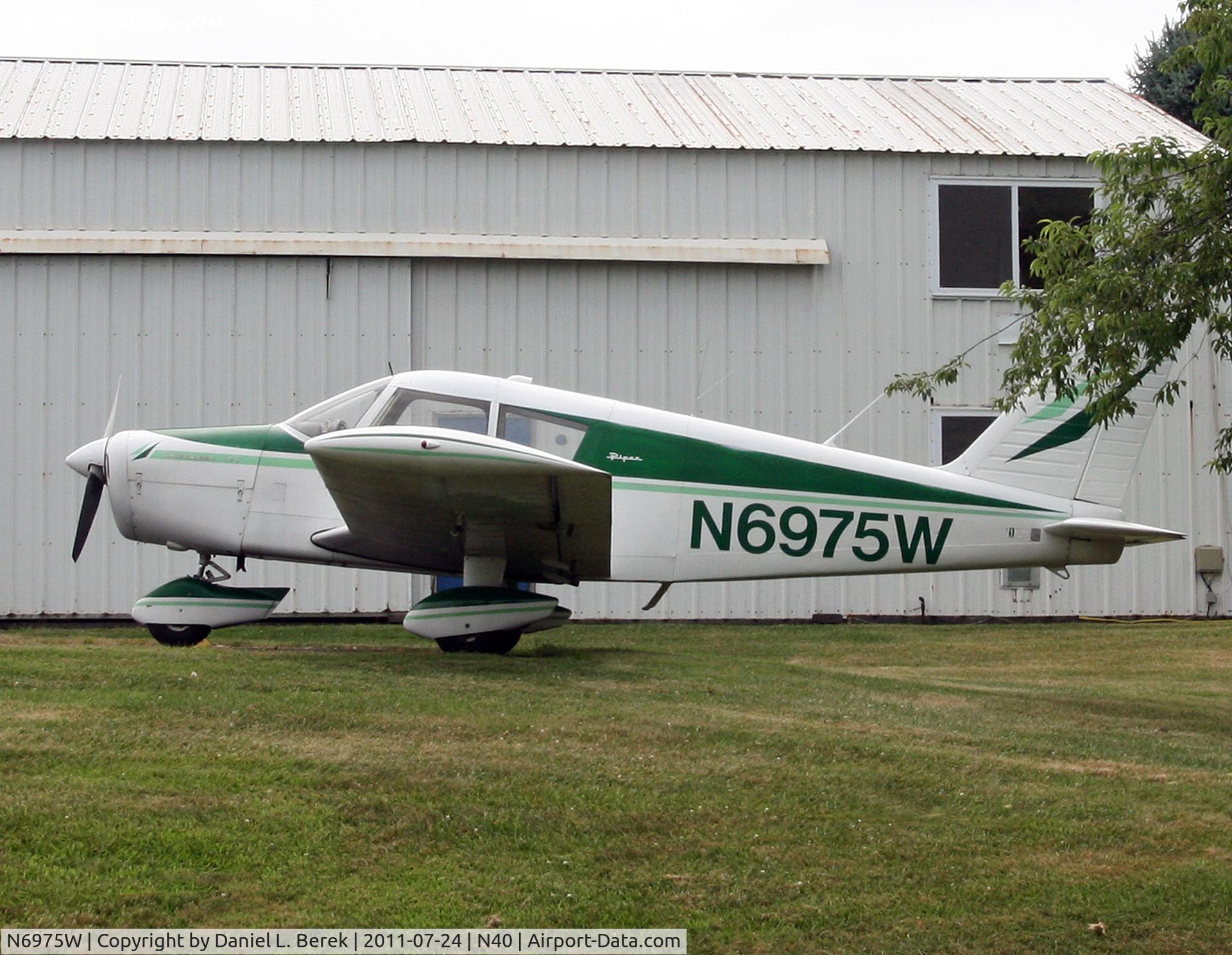 N6975W, 1965 Piper PA-28-140 C/N 28-21173, This nice-looking Cherokee was on the road to Sky Manor Airport.