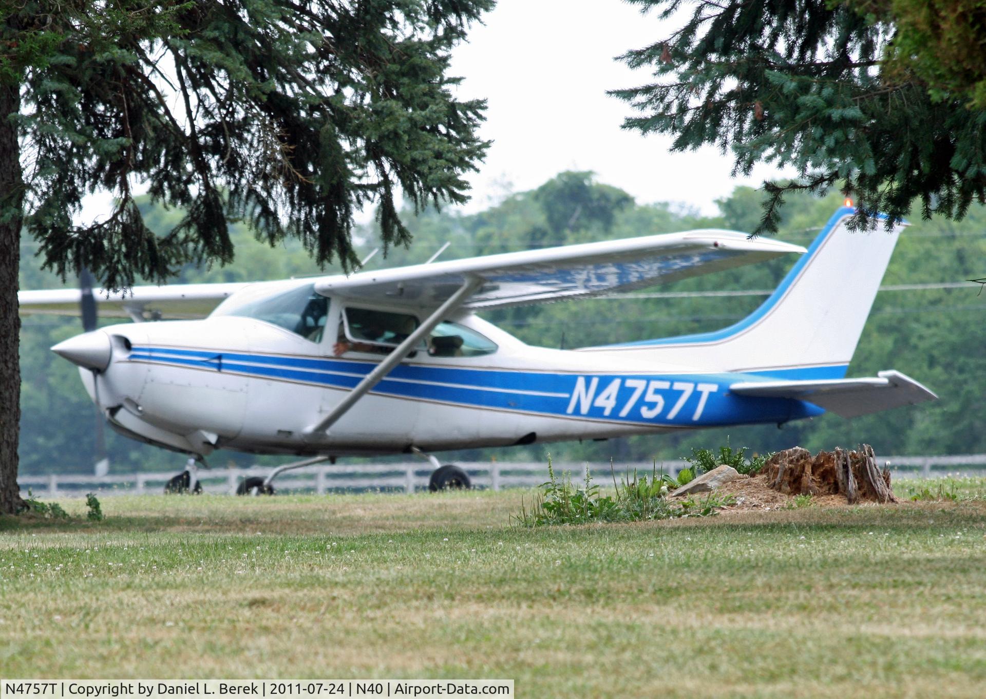 N4757T, 1981 Cessna R182 Skylane RG C/N R18201754, I quickly dropped to the ground to sneak a shot of this Skylane taxying by.