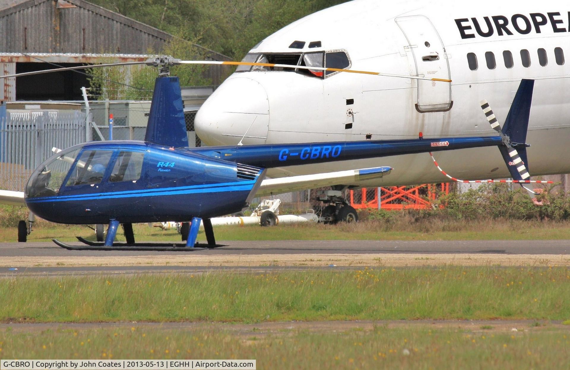 G-CBRO, 2002 Robinson R44 Raven C/N 1221, Parked at BHL