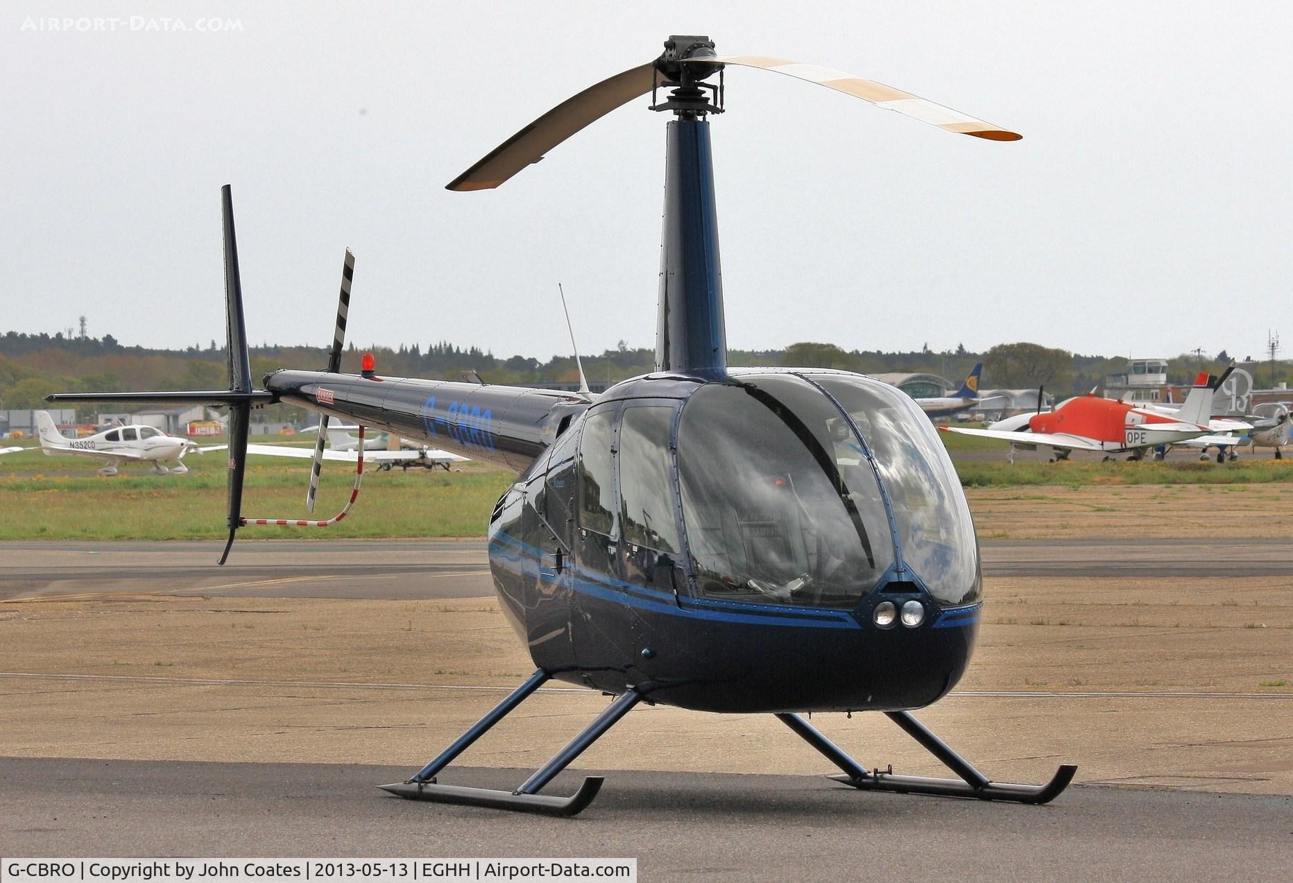 G-CBRO, 2002 Robinson R44 Raven C/N 1221, Parked at BHL