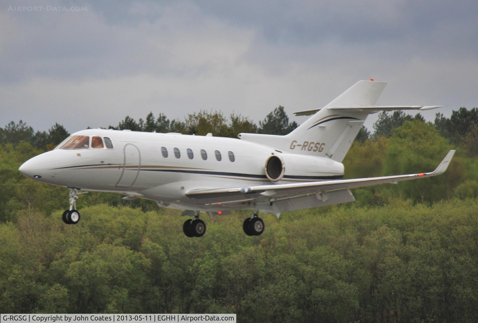 G-RGSG, 2009 Hawker Beechcraft 900XP C/N HA-0152, About to touchdown 26