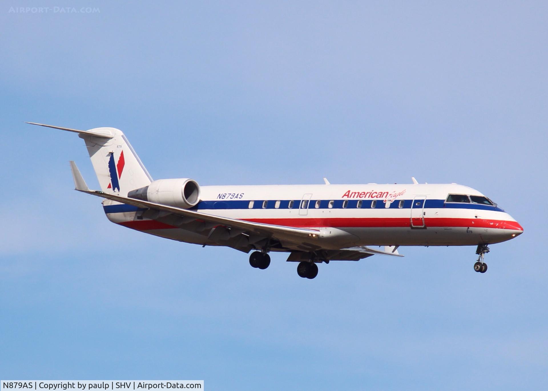 N879AS, 2002 Bombardier CRJ-200ER (CL-600-2B19) C/N 7600, Landing at Shreveport Regional.