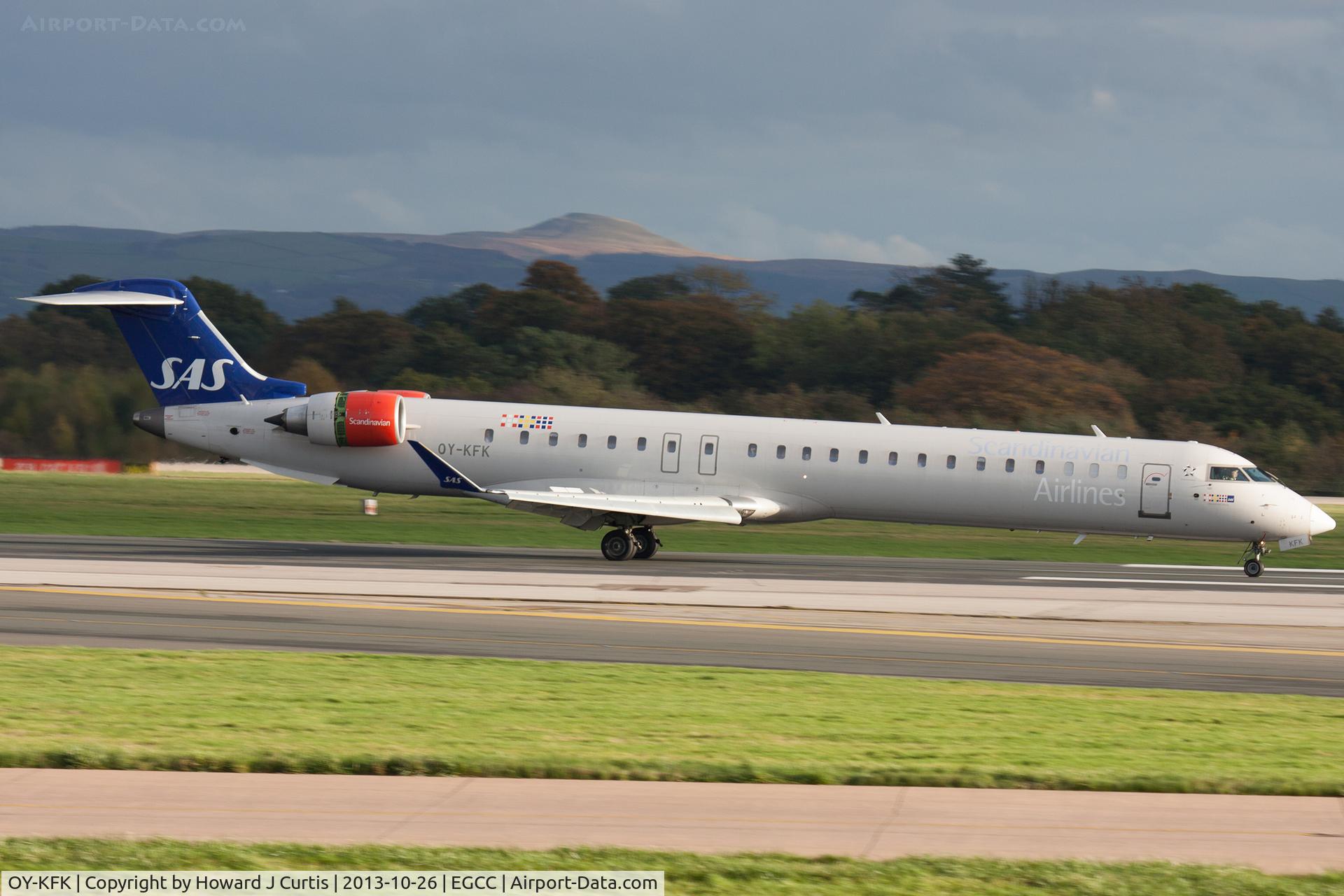 OY-KFK, 2009 Bombardier CRJ-900 (CL-600-2D24) C/N 15244, SAS, rolling out after landing.