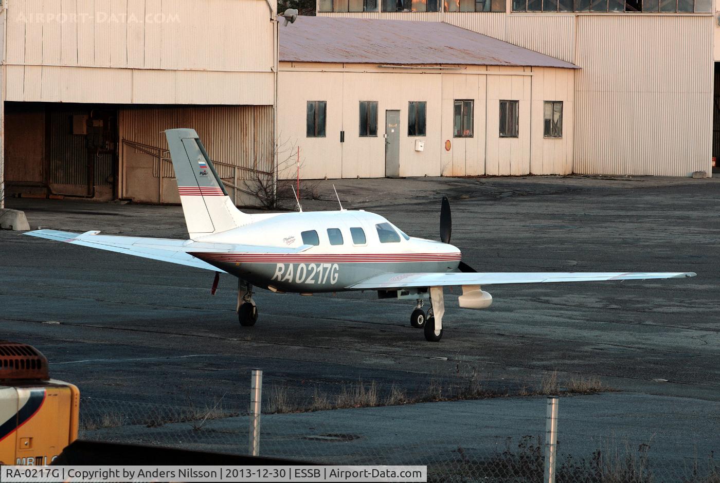 RA-0217G, 1996 Piper PA-46-350P Malibu Mirage Malibu Mirage C/N 4636040, Parked at the northern ramp.