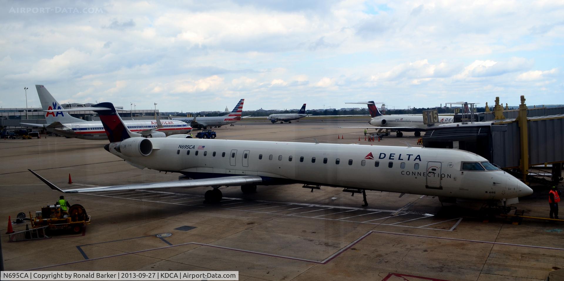 N695CA, 2006 Bombardier CRJ-900ER (CL-600-2D24) C/N 15097, Gate 15 DCA