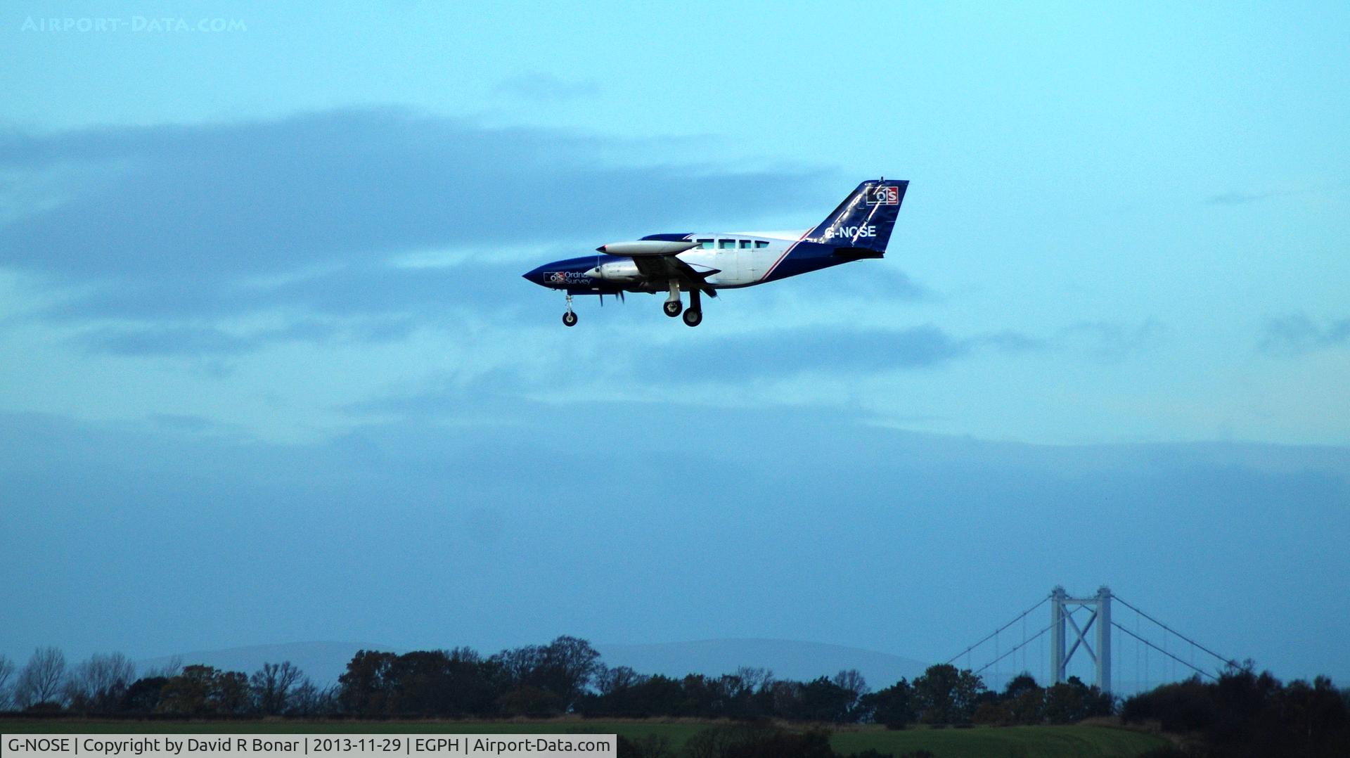 G-NOSE, 1975 Cessna 402B Utililiner C/N 402B-0823, Arriving Edinburgh in a grey winter light. The Forth Road Bridge in the background.