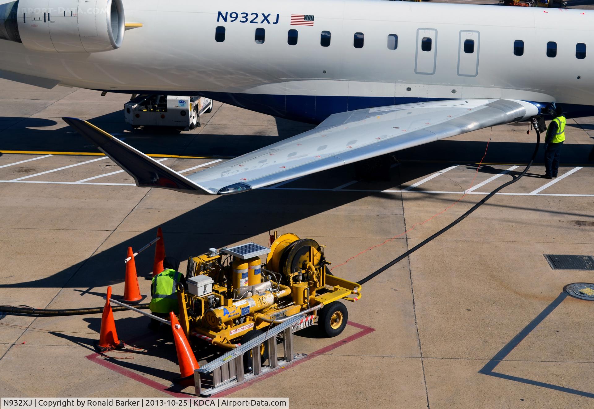 N932XJ, 2008 Bombardier CRJ-900ER (CL-600-2D24) C/N 15194, Gate 15 refueling operations DCA