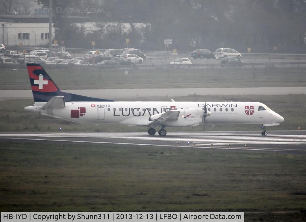HB-IYD, 1998 Saab 2000 C/N 2000-059, Lining up rwy 14L for departure in special Lugano c/s