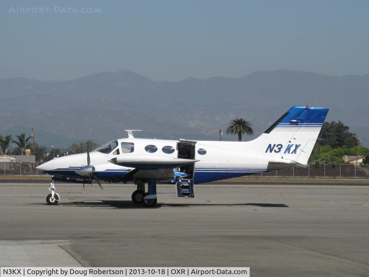 N3KX, 1971 Cessna 414 Chancelor Chancellor C/N 414-0161, 1971 Cessna 414, two Continental TSIO-520-J 310 Hp turbocharged and pressurized, tip tanks, airstair door open.