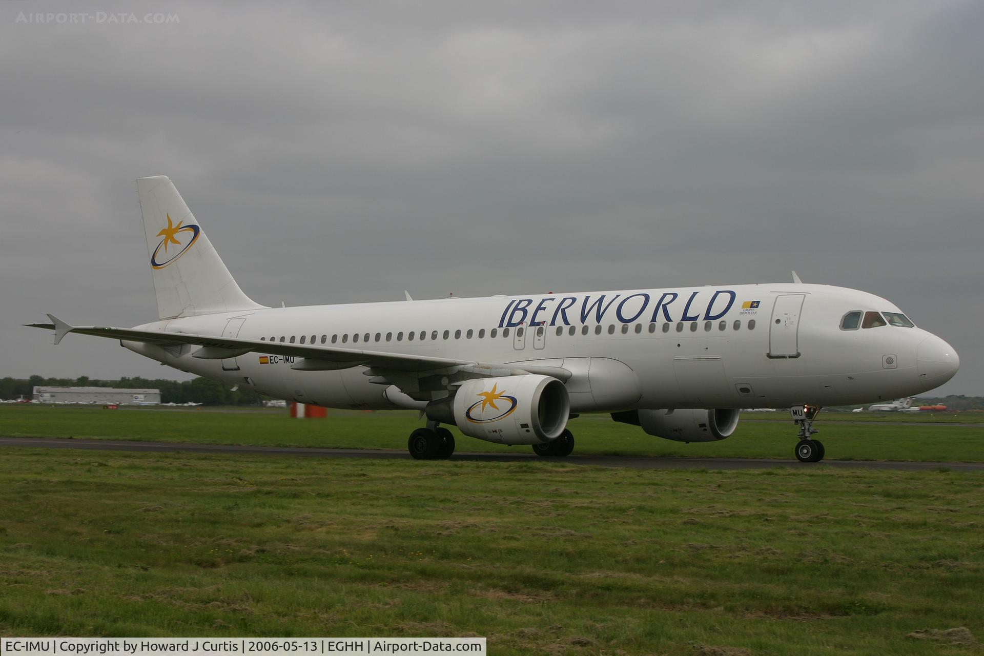 EC-IMU, 1999 Airbus A320-214 C/N 1130, Iberworld, taxiing in after arriving on runway 26.