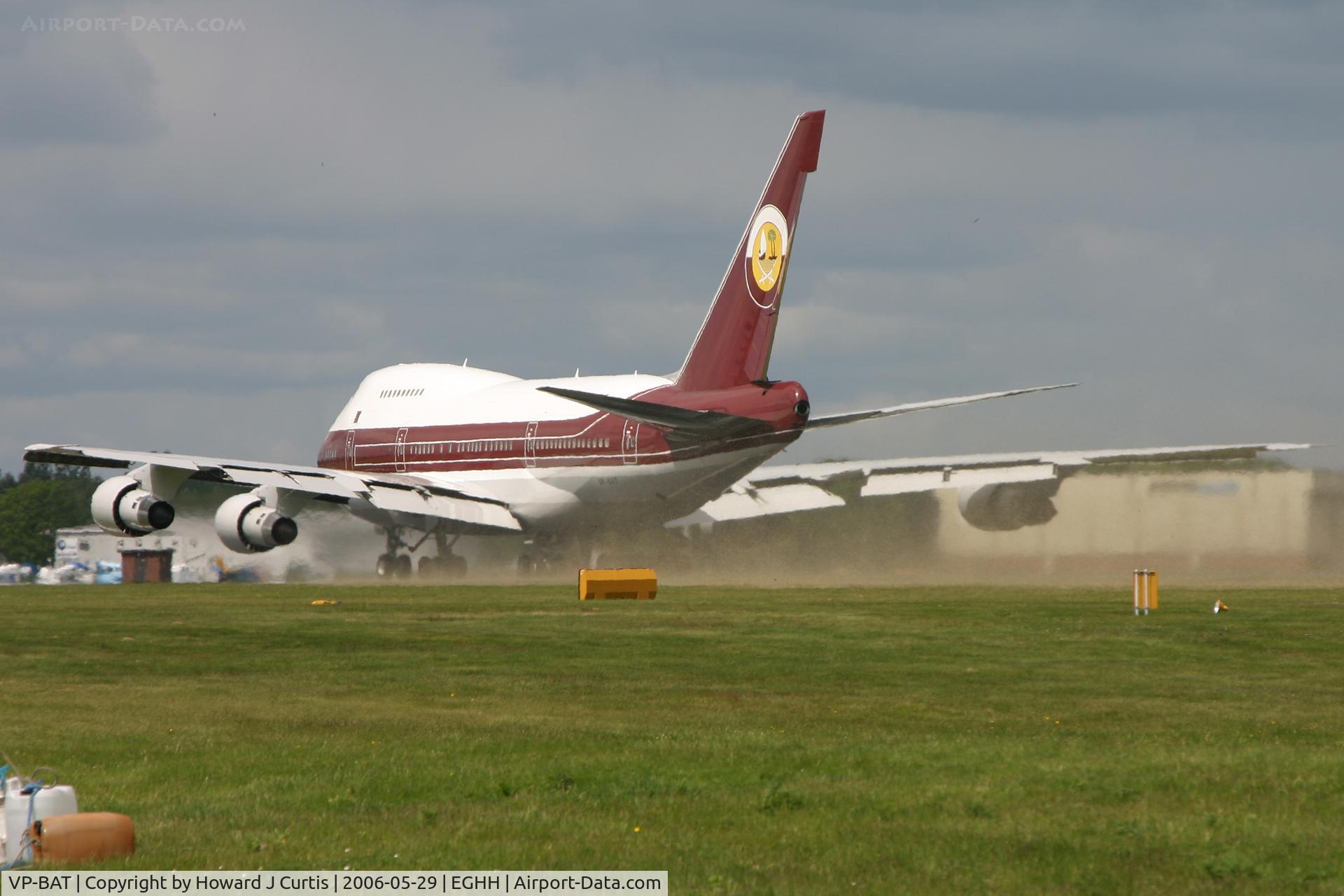 VP-BAT, 1979 Boeing 747SP-21 C/N 21648, A series of three. This is what happens when a 747SP departs and you've just mown the grass. Photo 2/3: a small green mist appearing behind.