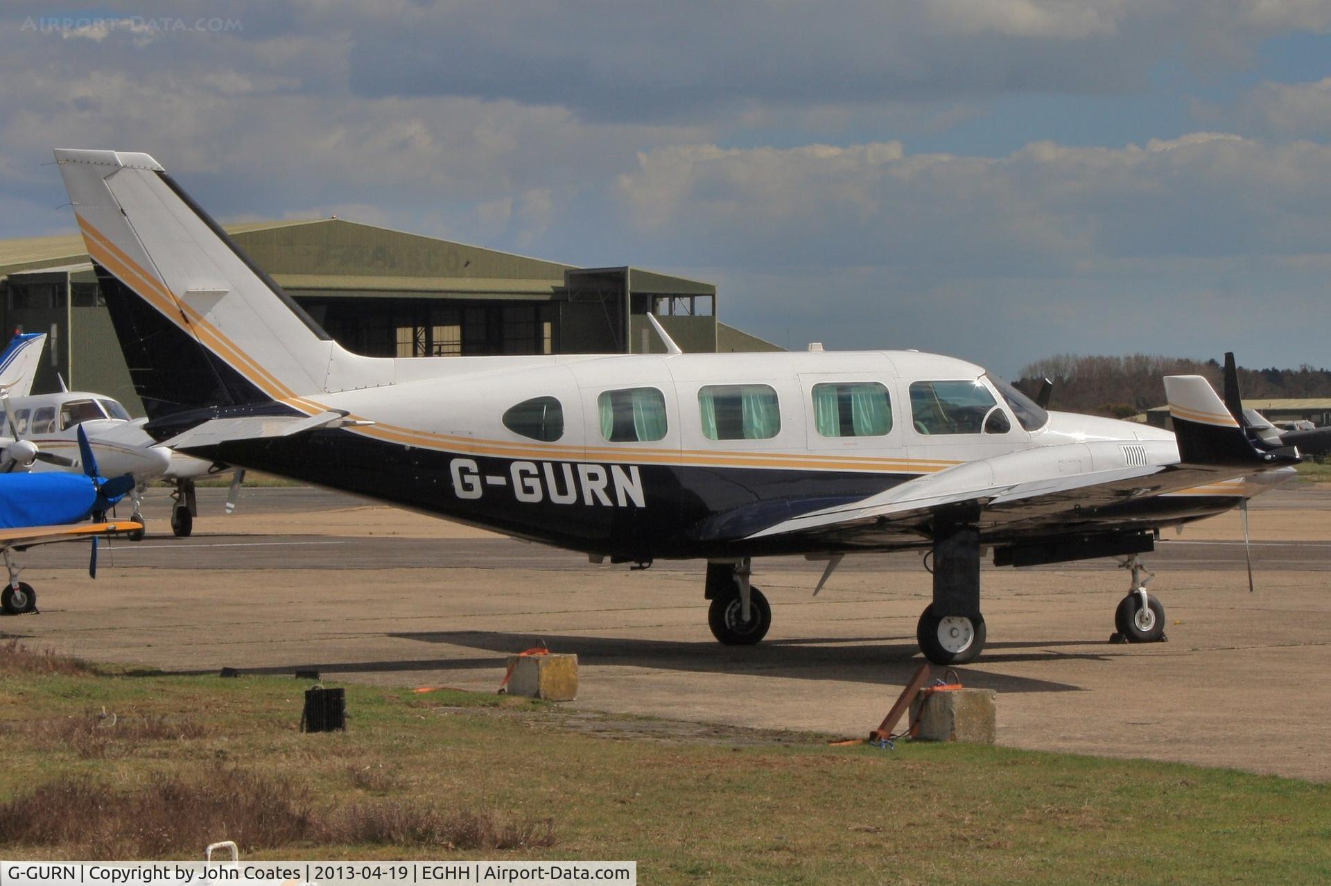 G-GURN, 1979 Piper PA-31-310 Navajo Navajo C/N 31-7912117, Parked at BHL
