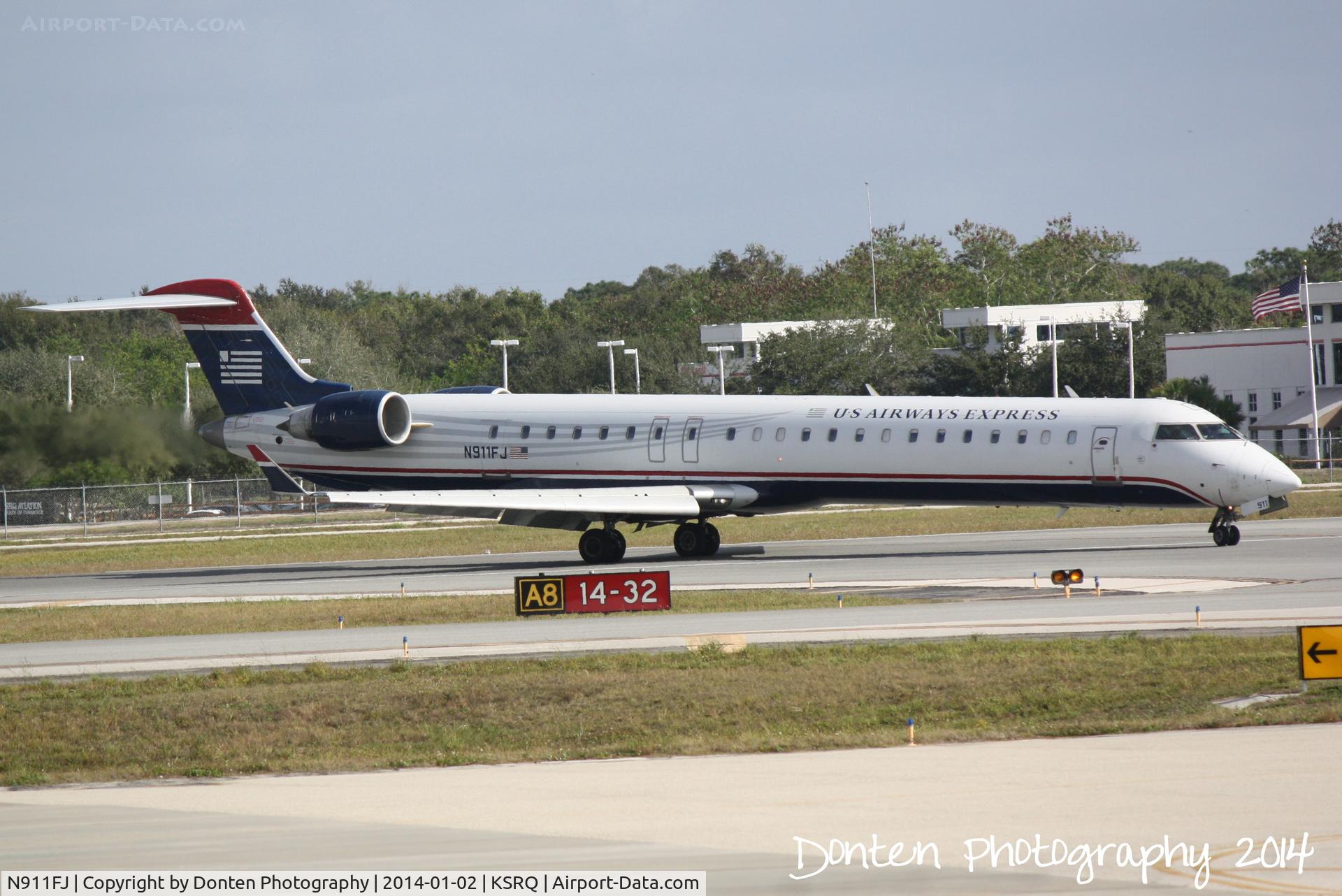 N911FJ, 2003 Bombardier CRJ-900ER (CL-600-2D24) C/N 15011, US Air Flight 2681 operated by Mesa (N911FJ) arrives at Sarasota-Bradenton International Airport following a flight from Charlottte-Douglas International Airport
