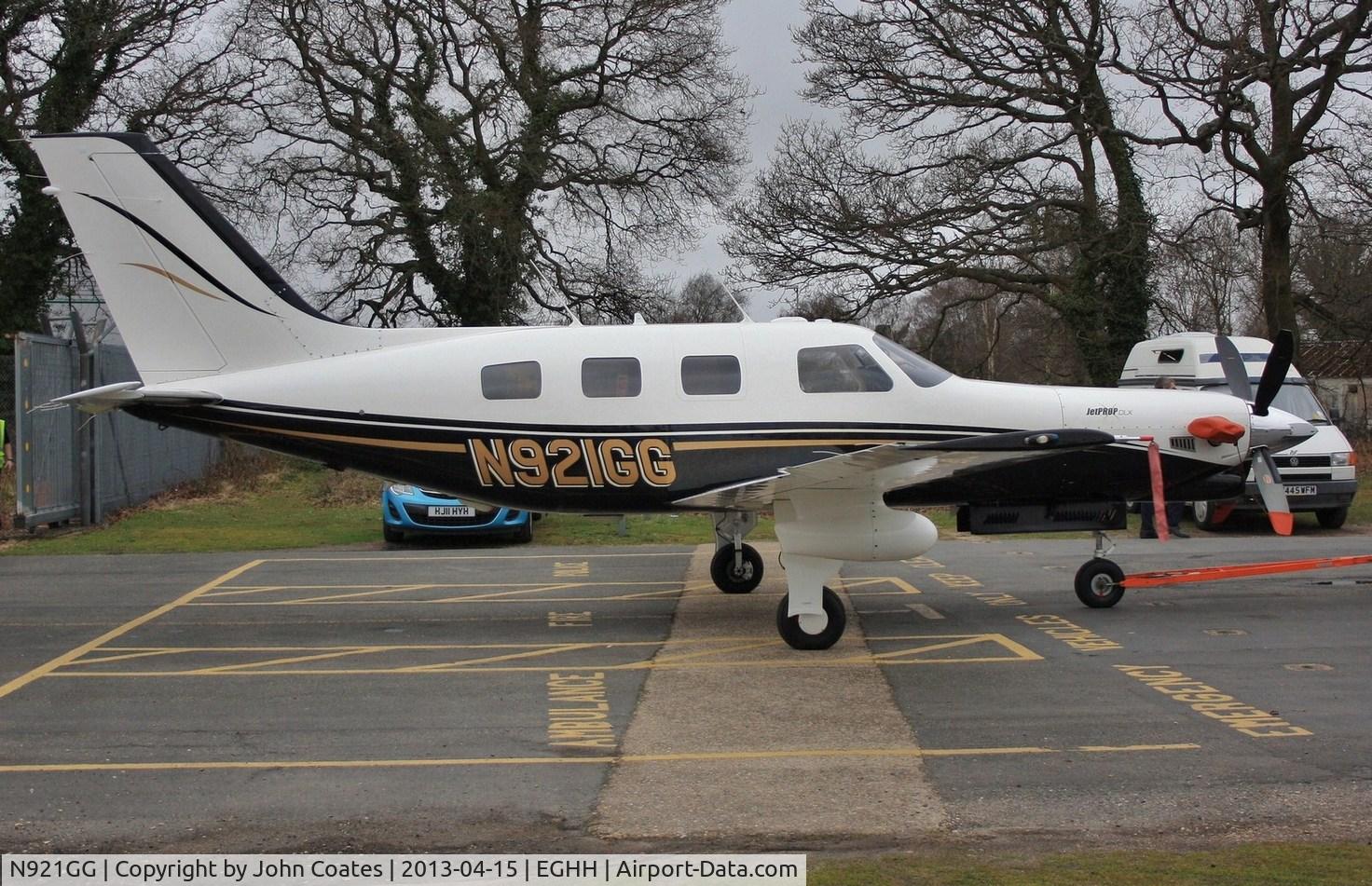 N921GG, 1998 Piper PA-46-350P Malibu Mirage C/N 4636136, Being towed to paintshop