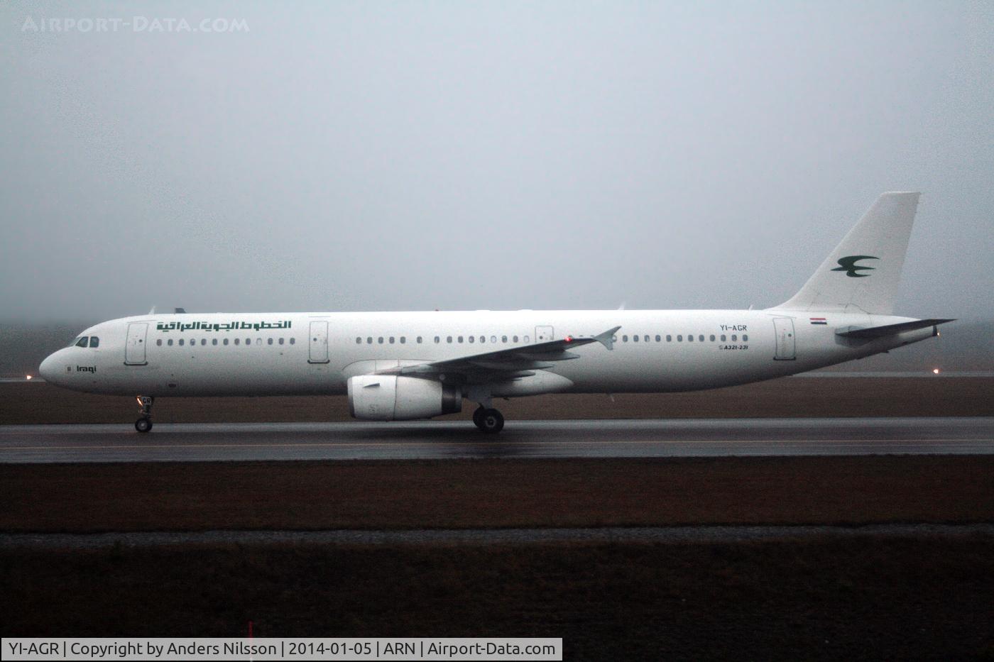 YI-AGR, 2010 Airbus A321-231 C/N 4067, Taxiing on taxiway W after landing 19L in fog.