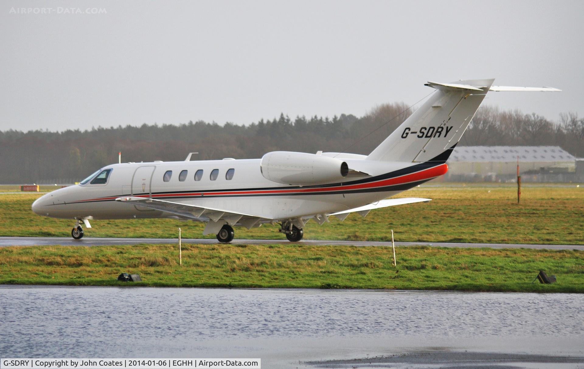 G-SDRY, 2013 Cessna 525C CitationJet CJ4 C/N 525C-0134, Just a slight puddle after the latest downpour!