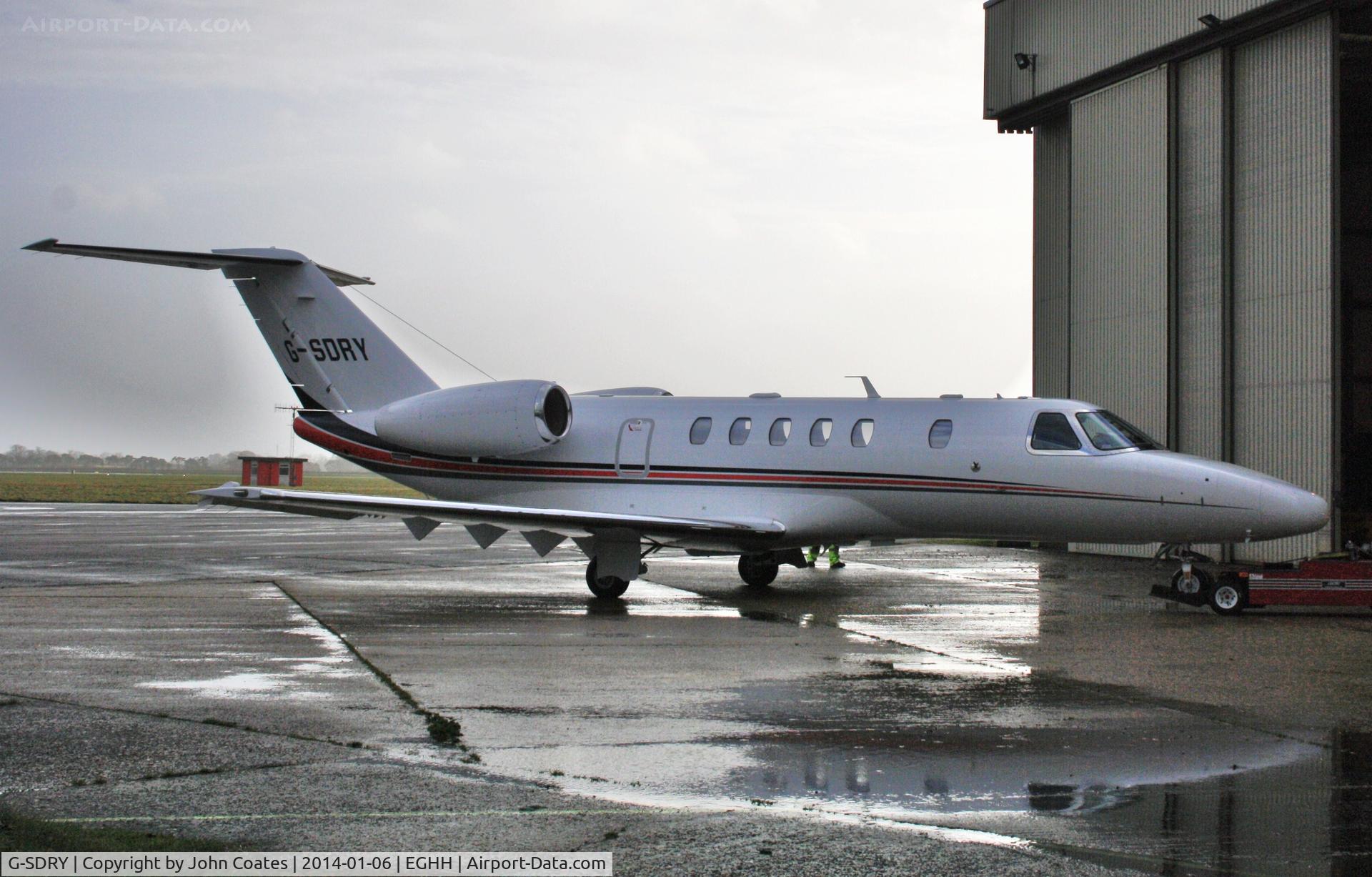 G-SDRY, 2013 Cessna 525C CitationJet CJ4 C/N 525C-0134, Entering the hangar soon after arrival.