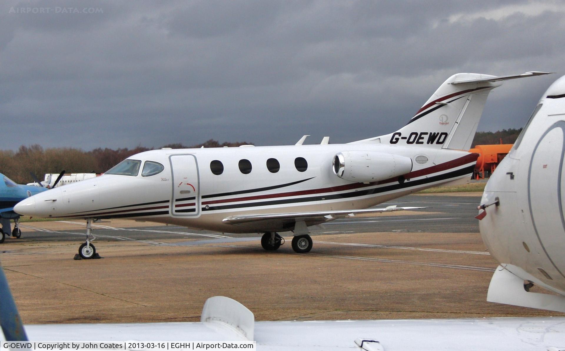 G-OEWD, 2005 Beech 390 Premier I C/N RB-126, On a busy apron at Jetworks
