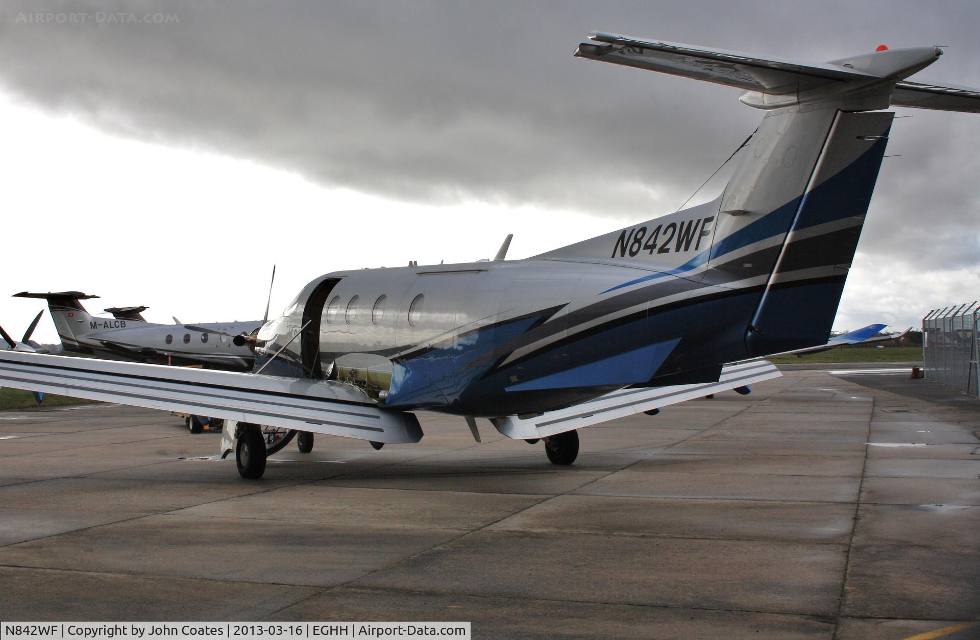 N842WF, 2007 Pilatus PC-12/47 C/N 842, Parked at busy Pilatus Centre