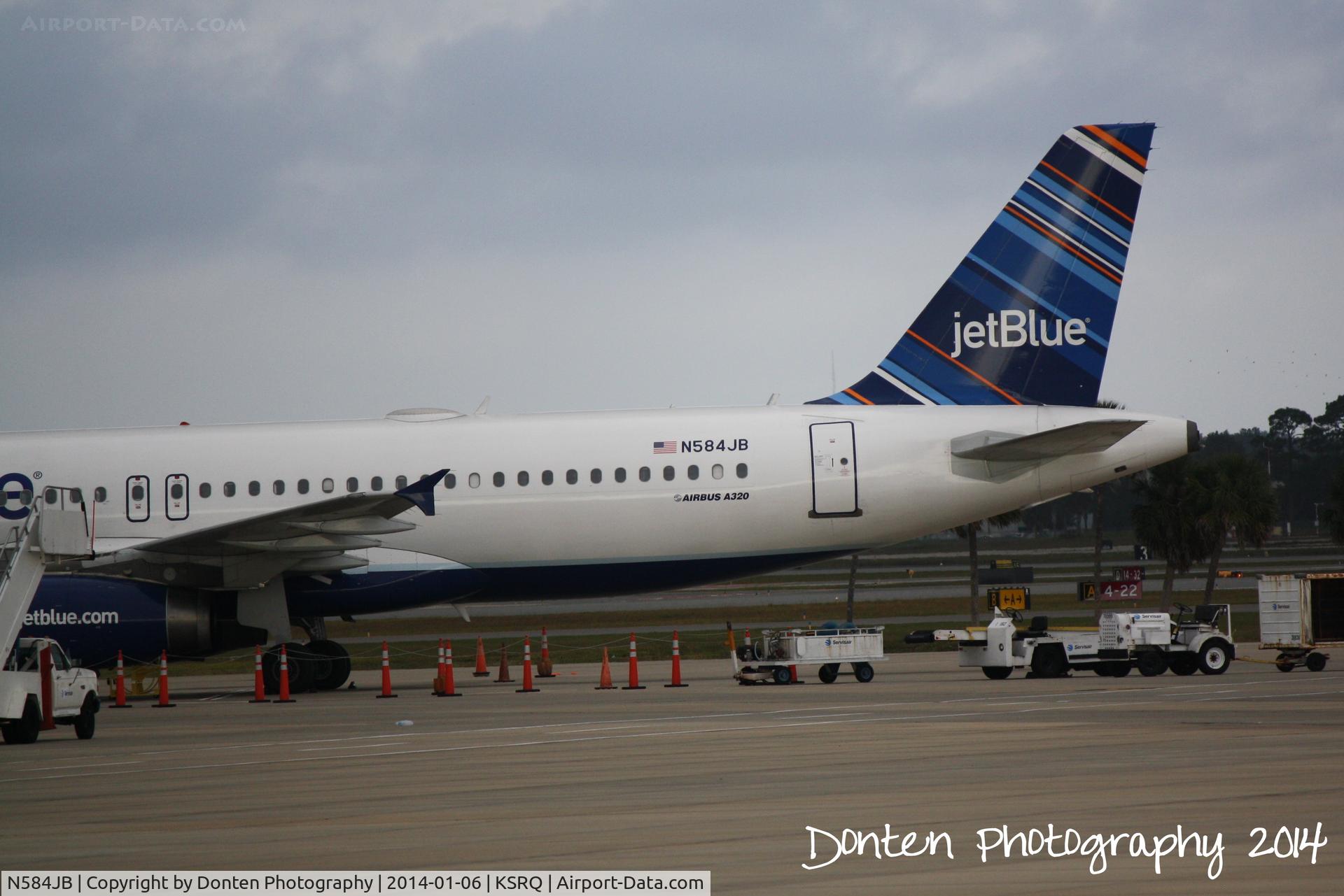N584JB, 2004 Airbus A320-232 C/N 2149, JetBlue Airbus A320 (N584JB) stranded at Sarasota-Bradenton International Airport following Winter Storm Hercules in the Northeast