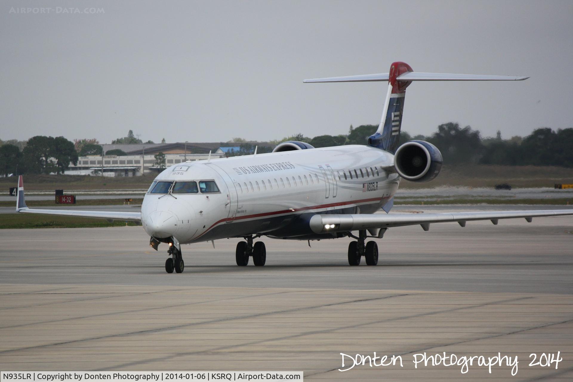 N935LR, 2005 Bombardier CRJ-900ER (CL-600-2D24) C/N 15035, US Air Flight 2675 operated by Mesa (N935LR) arrives at Sarasota-Bradenton International Airport following a flight from Charlotte-Douglas International Airport