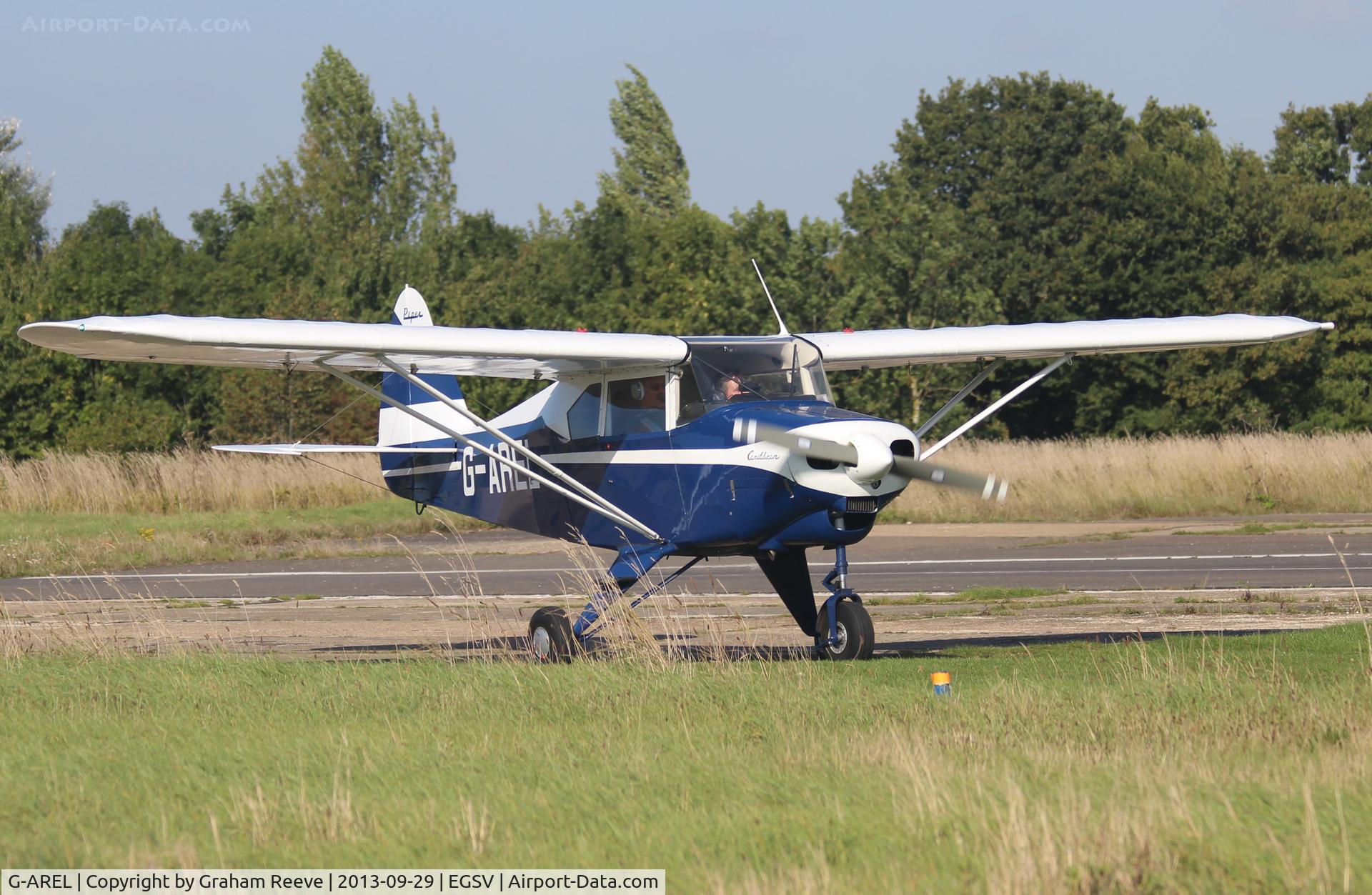 G-AREL, 1960 Piper PA-22-150 Caribbean C/N 22-7284, Just landed.