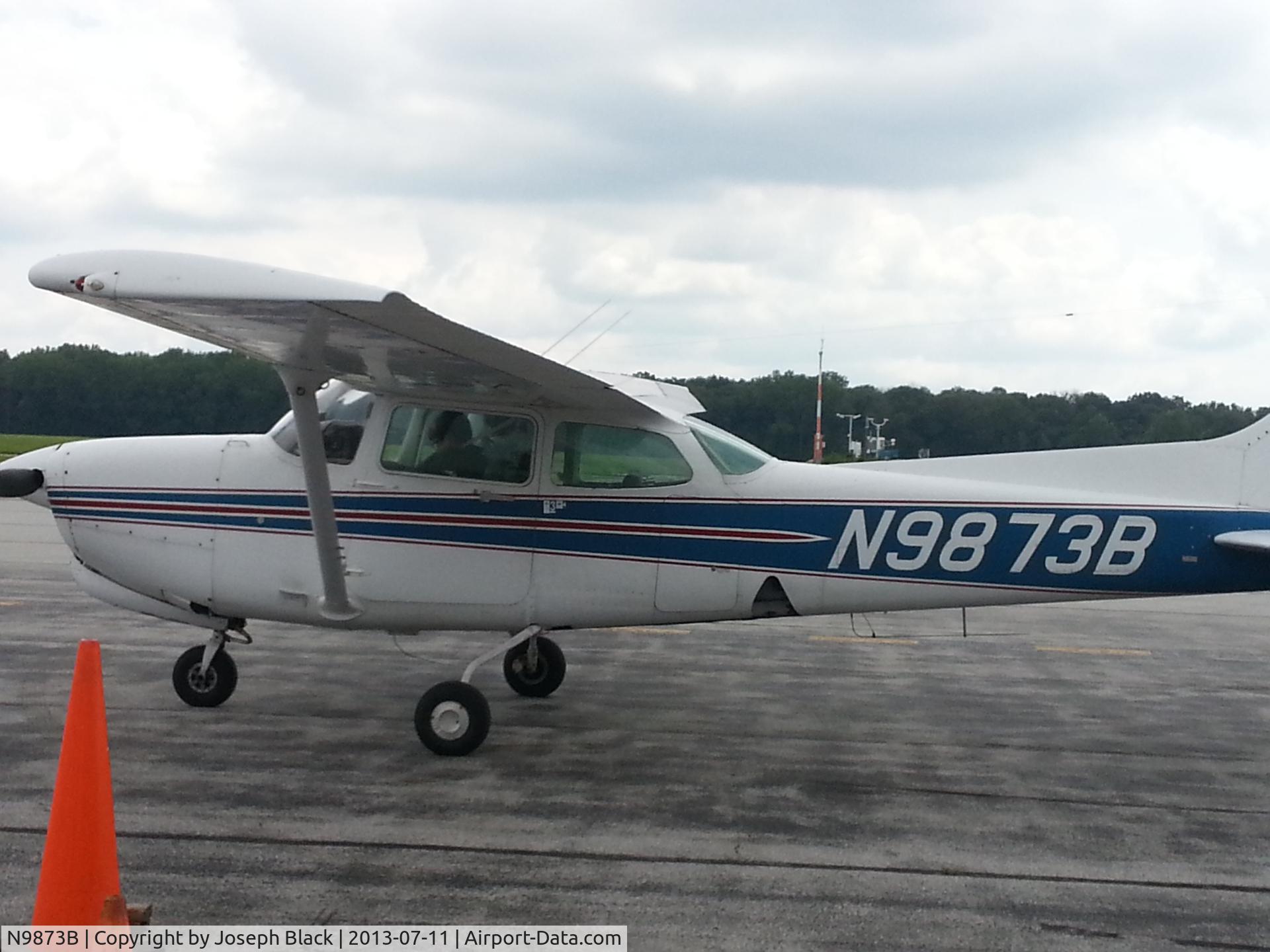 N9873B, 1982 Cessna 172RG Cutlass RG C/N 172RG1064, At Dayton-Wright Brothers Airport on July 11, 2013. Aircamp student Logan Black in the cockpit.