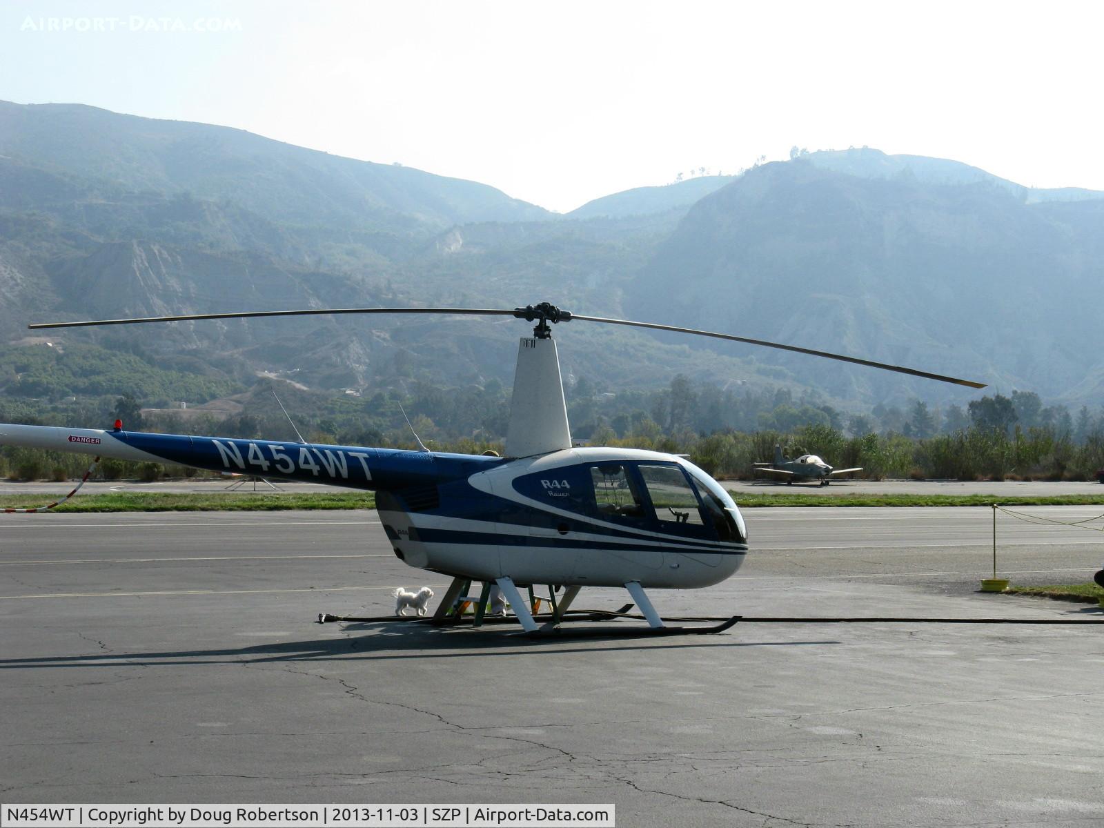 N454WT, 2001 Robinson R44 Raven II C/N 1042, 2001 Robinson R44 RAVEN, Lycoming O-540-F1B5 derated to 205 Hp continuous, at fuel dock