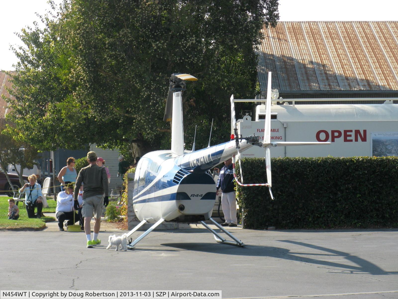 N454WT, 2001 Robinson R44 Raven II C/N 1042, 2001 Robinson R44 RAVEN, Lycoming O-540-F1B5 derated to 205 Hp continuous, at fuel dock