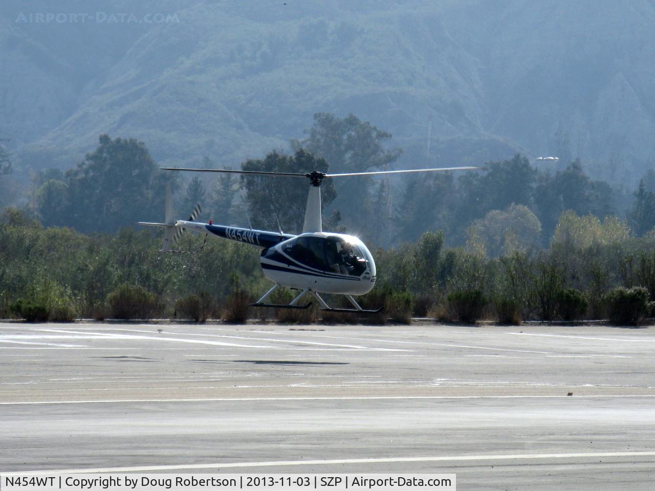 N454WT, 2001 Robinson R44 Raven II C/N 1042, 2001 Robinson R44 RAVEN, Lycoming O-540-F1B5 derated to 205 Hp continuous, hover turn near SZP Helipad