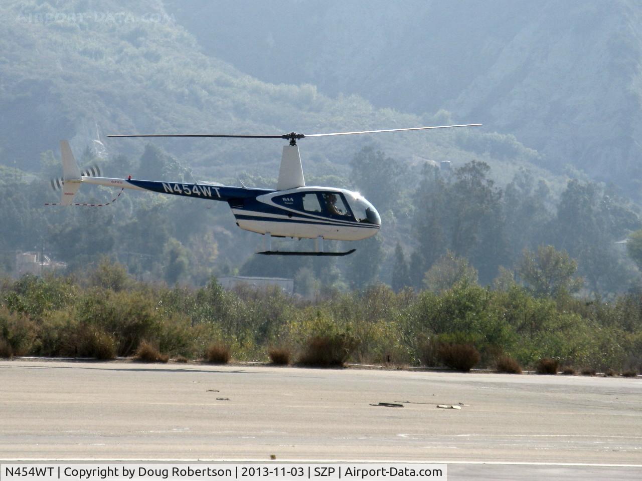 N454WT, 2001 Robinson R44 Raven II C/N 1042, 2001 Robinson R44 RAVEN, Lycoming O-540-F1B5 derated to 205 Hp continuous, approaching SZP Helipad via Santa Clara River route
