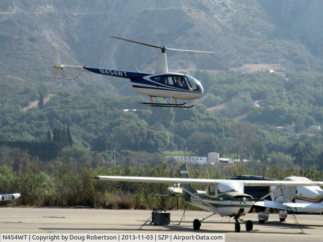 N454WT, 2001 Robinson R44 Raven II C/N 1042, 2001 Robinson R44 RAVEN, Lycoming O-540-F1B5 derated to 205 Hp continuous, approaching SZP Helipad via Santa Clara River route