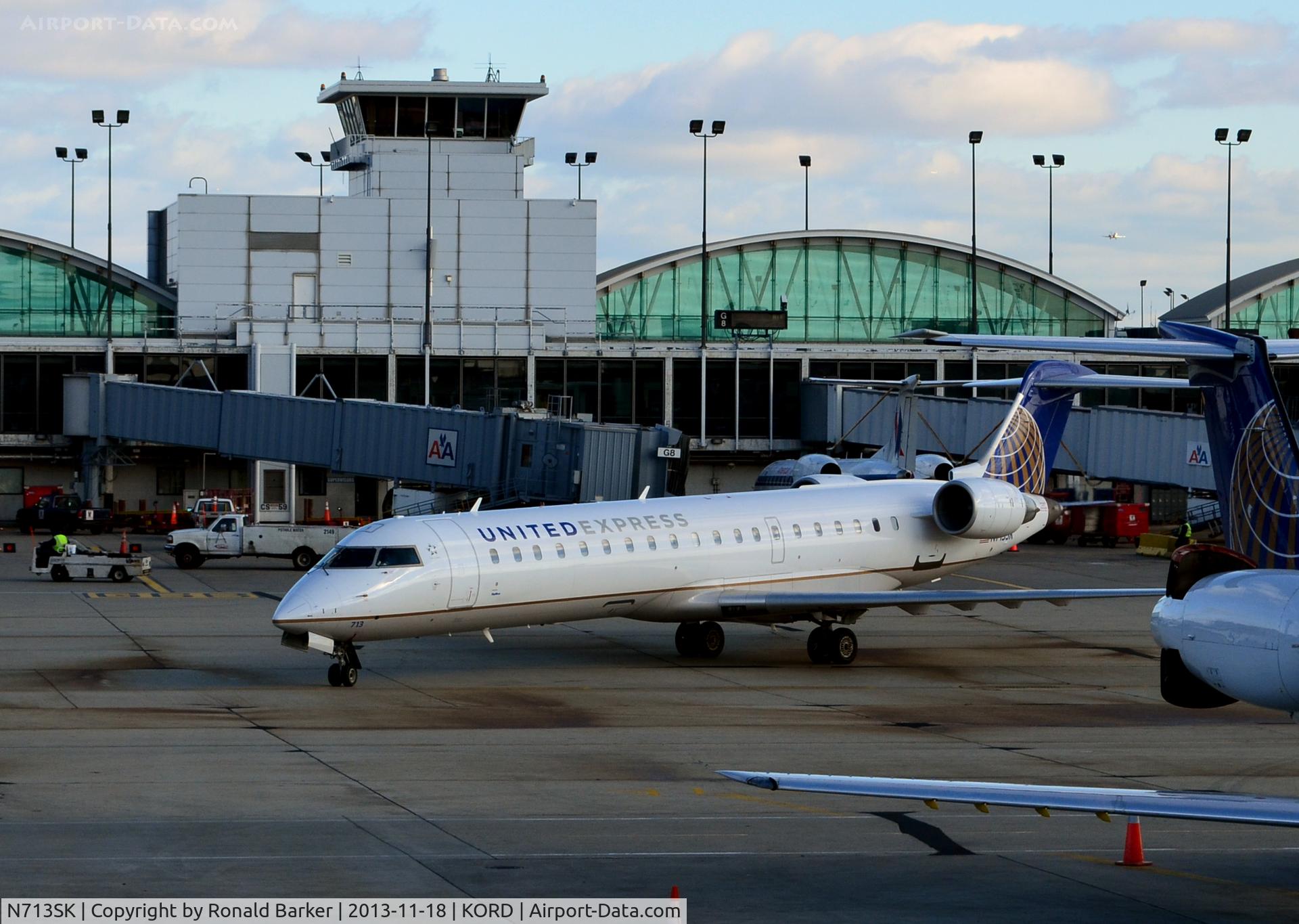 N713SK, 2004 Bombardier CRJ-701ER (CL-600-2C10) Regional Jet C/N 10174, Taxi ORD