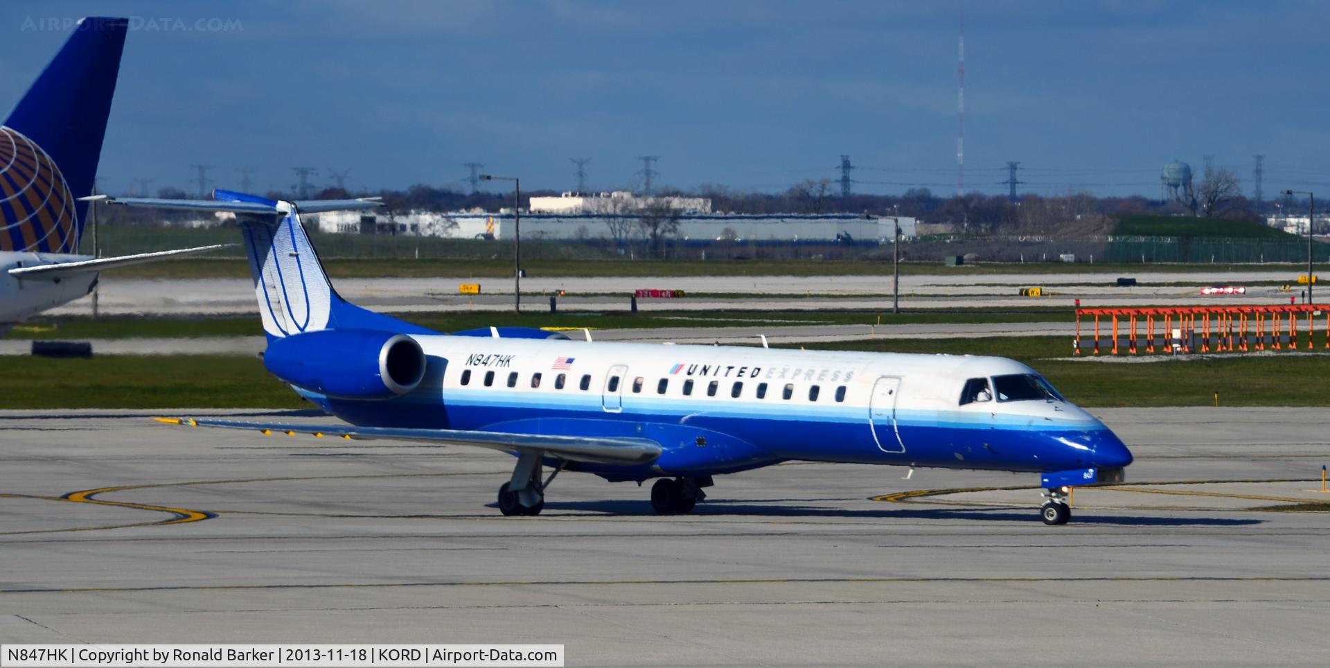 N847HK, 2004 Embraer ERJ-145LR (EMB-145LR) C/N 14500857, Taxi ORD