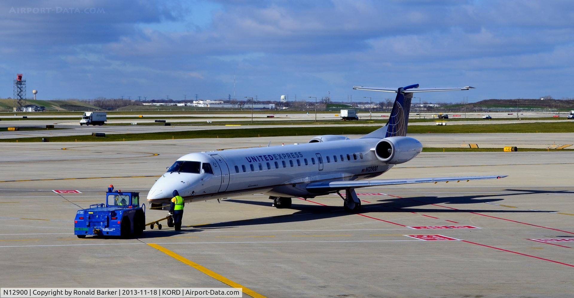 N12900, 2001 Embraer ERJ-145LR (EMB-145LR) C/N 145511, Pushback at Gate C8 ORD