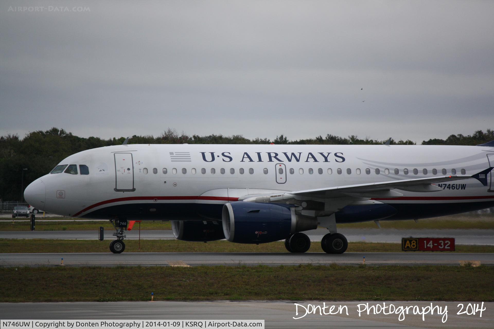 N746UW, 2000 Airbus A319-112 C/N 1297, US Air Flight 2015 (N746UW) arrives at Sarasota-Bradenton International Airport following a flight from Charlotte-Douglas International Airport