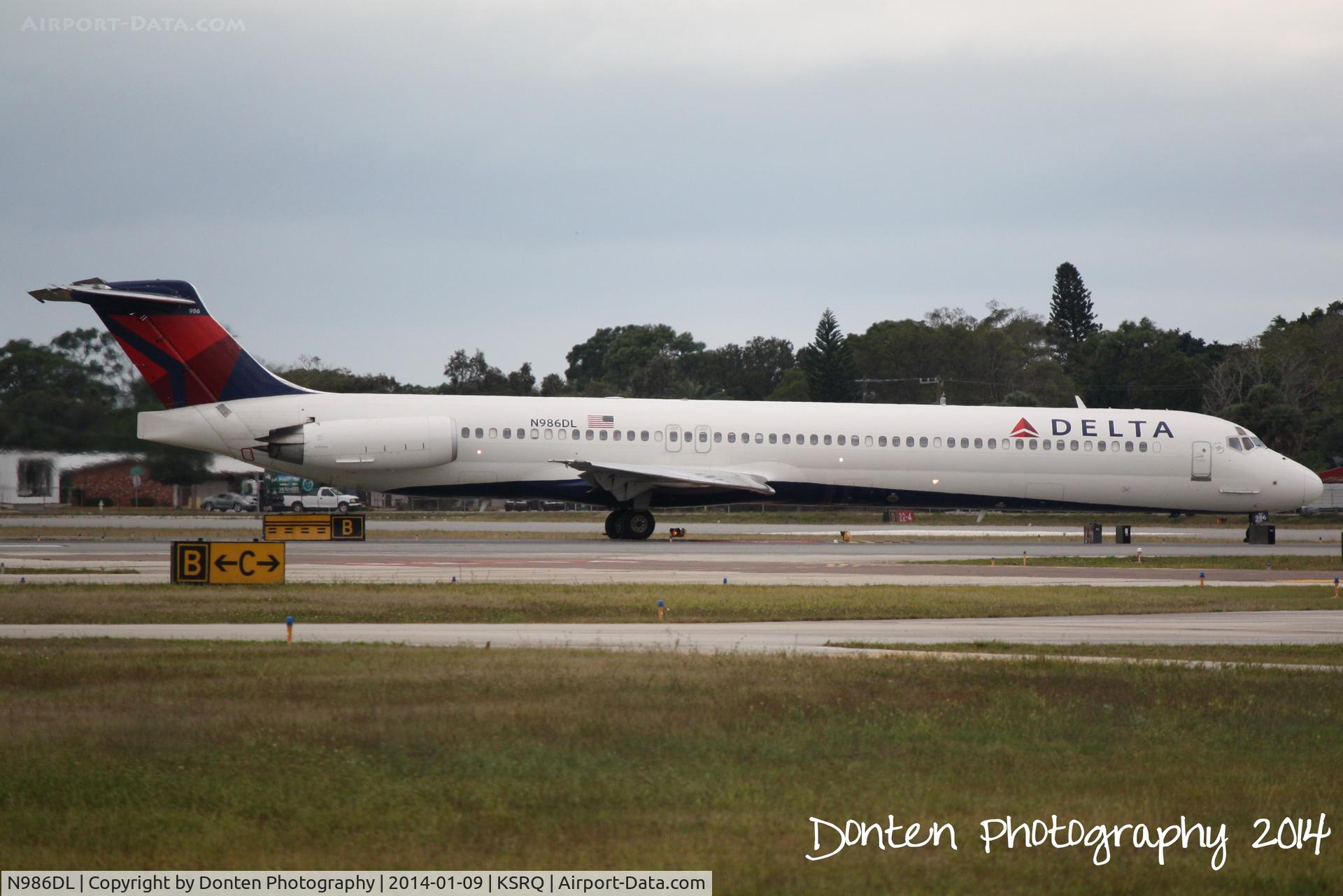 N986DL, 1991 McDonnell Douglas MD-88 C/N 53313, Delta Flight 2068 (N986DL) taxis at Sarasota-Bradenton International Airport