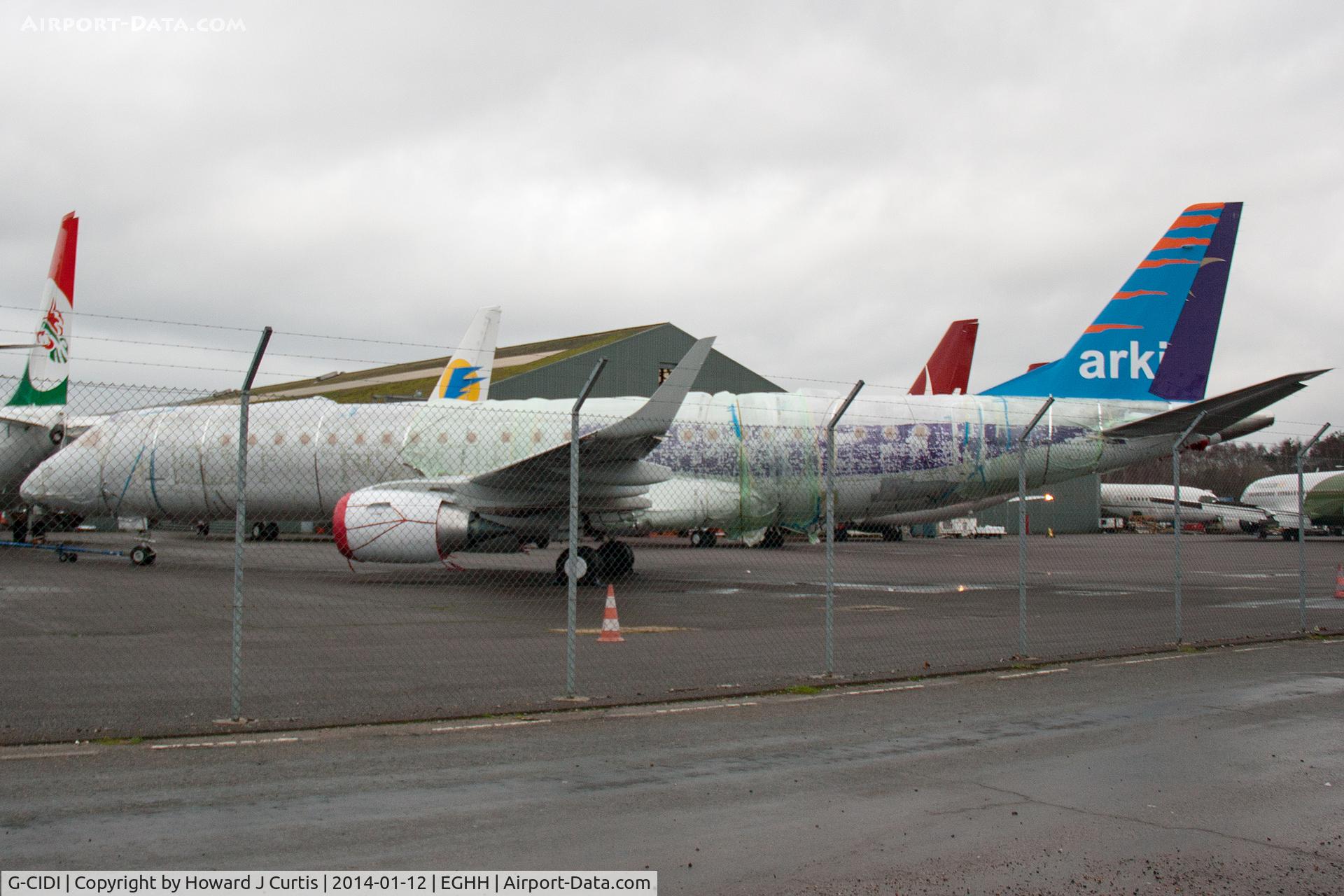 G-CIDI, 2013 Embraer 190LR (ERJ-190-100LR) C/N 19000616, Painted in partial Arkia colours with 4X-EBM under the wing.