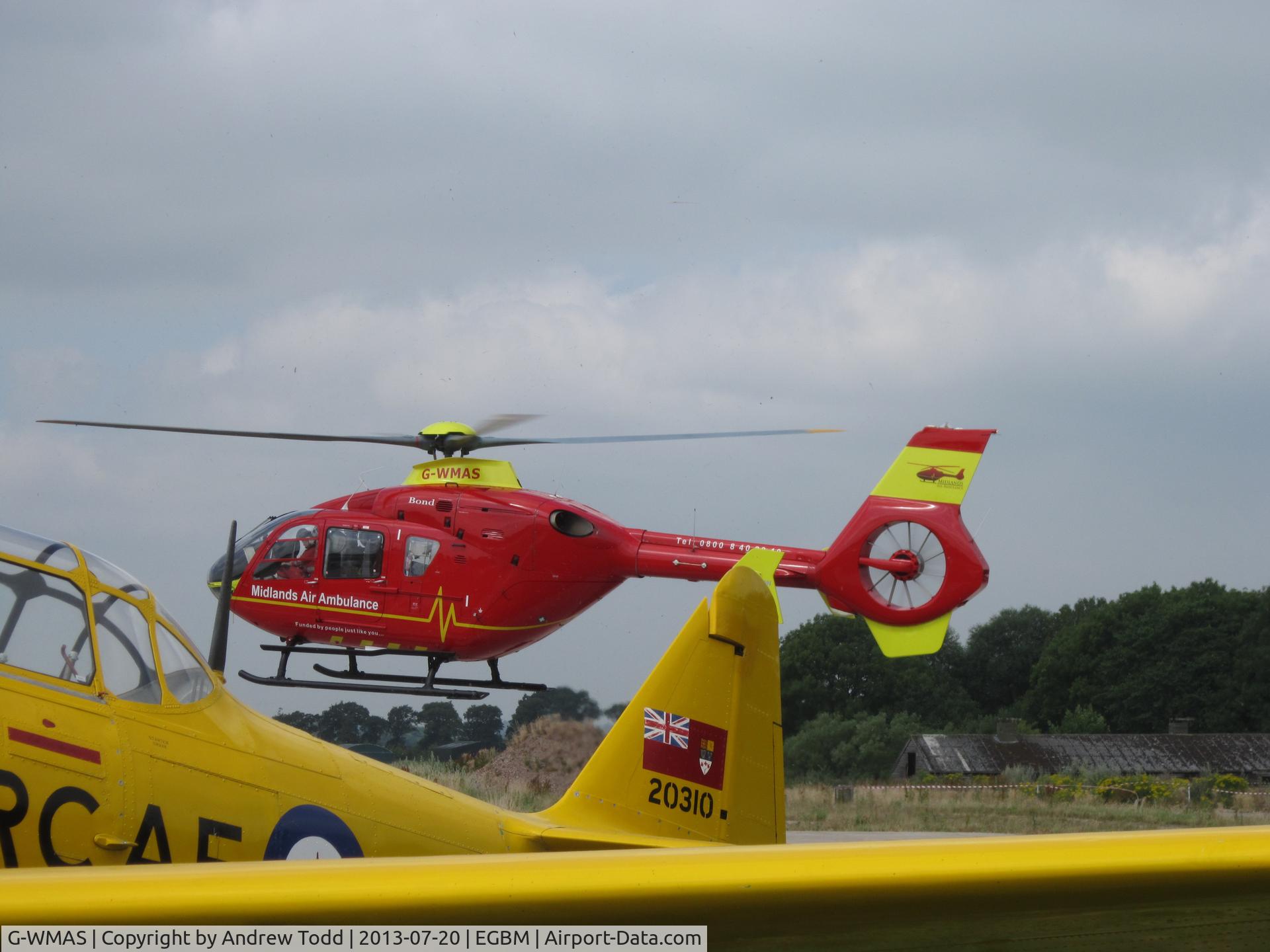 G-WMAS, 2001 Eurocopter EC-135T-2 C/N 0174, Air ambulance taking off from Tatenhill during 2013 funding raising day