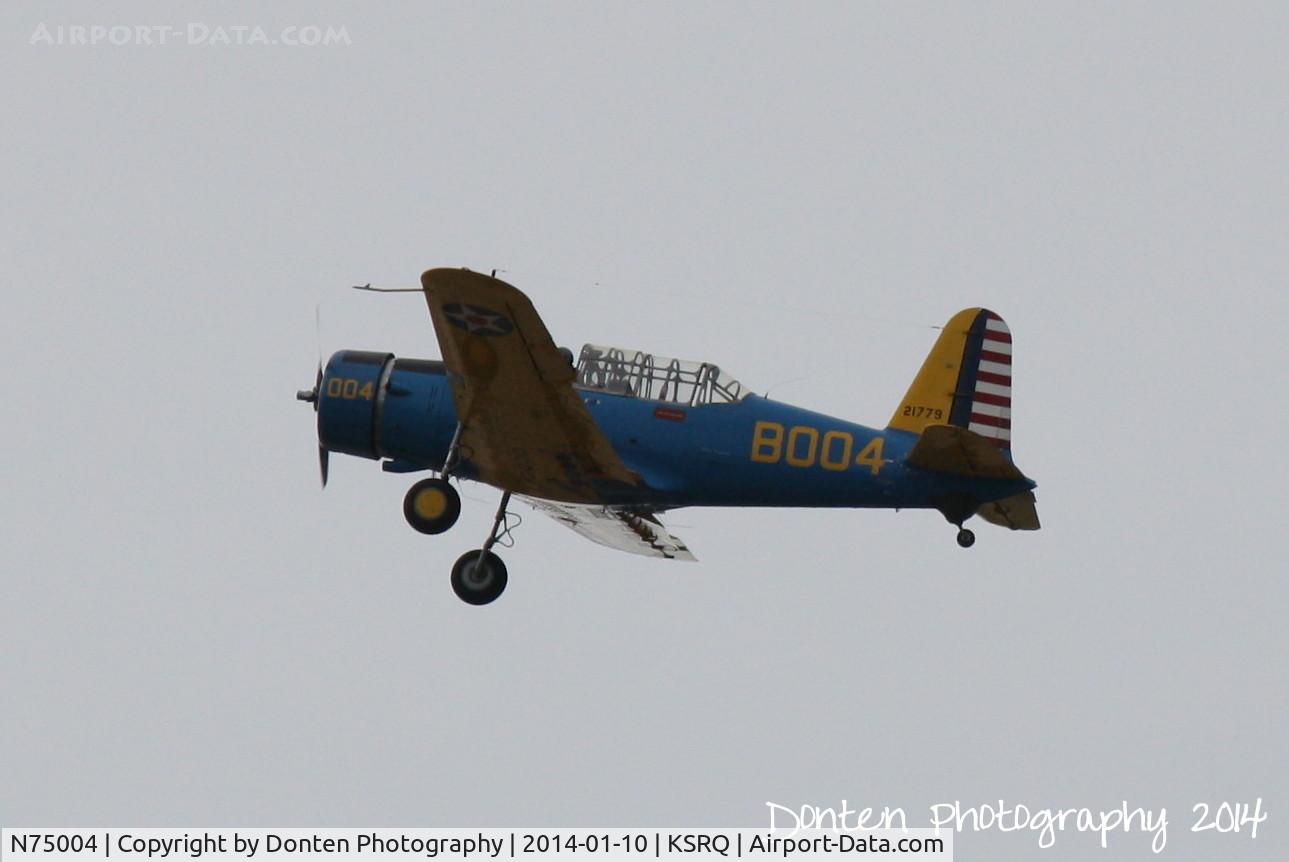 N75004, 1942 Convair BT-15 C/N 6720, BT-15 Valiant (N75004) departs Sarasota-Bradenton International Airport