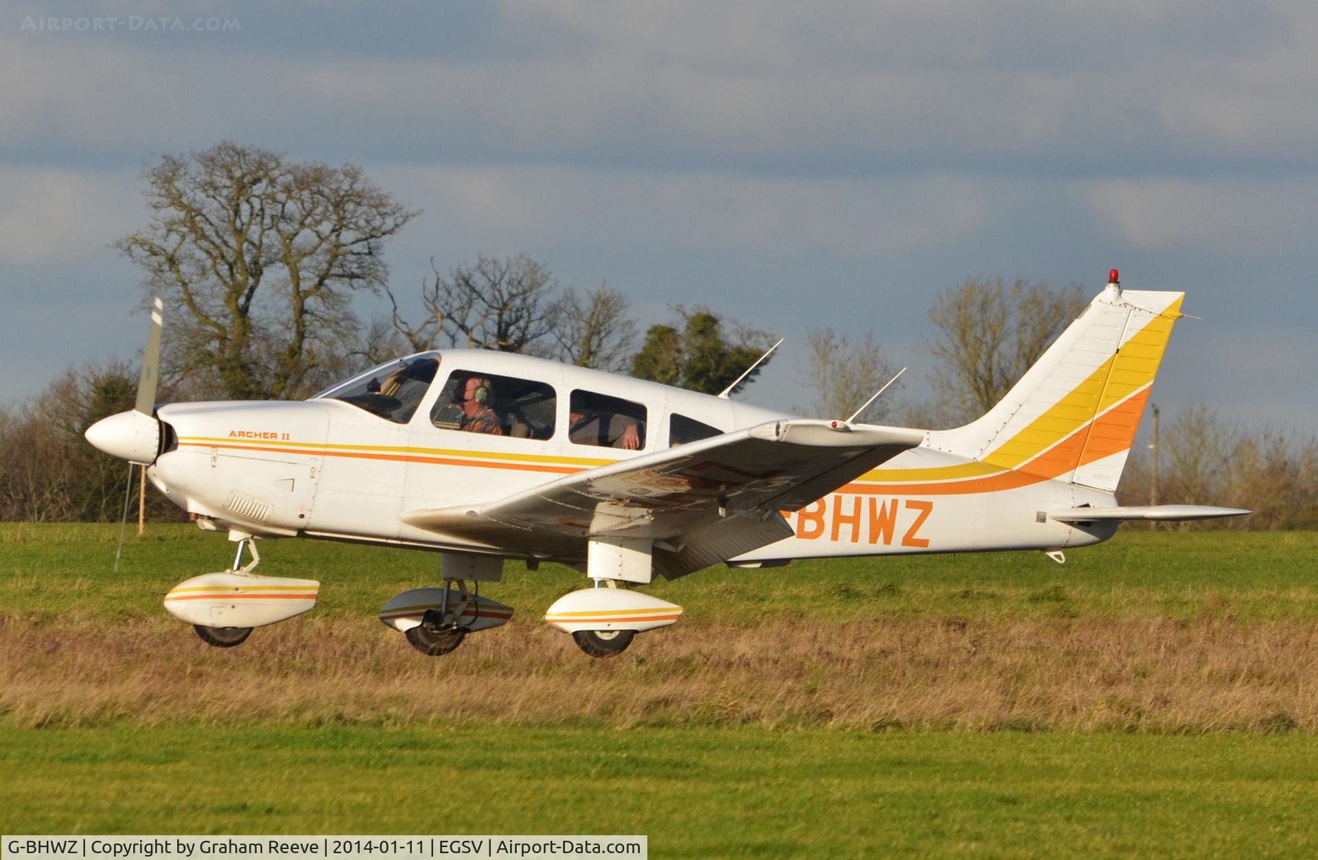 G-BHWZ, 1978 Piper PA-28-181 Cherokee Archer II C/N 28-7890299, About to touch down.
