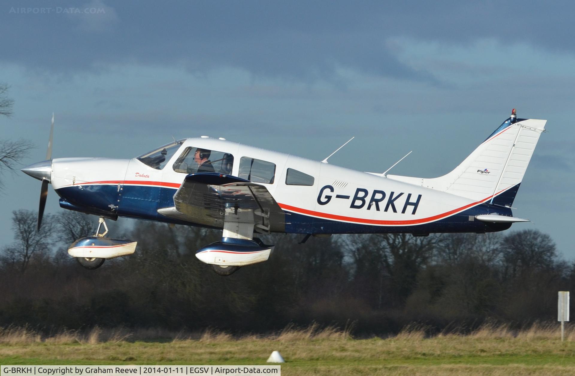 G-BRKH, 1979 Piper PA-28-236 Dakota C/N 28-7911003, Just taken off.