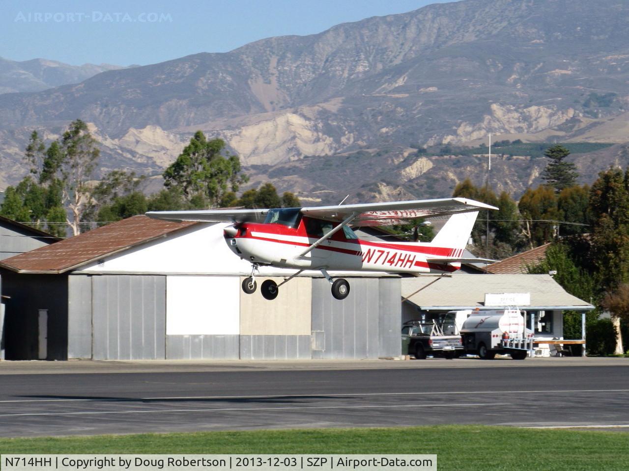 N714HH, 1977 Cessna 150M C/N 15079185, 1977 Cessna 150M, Continental O-200 100 Hp. takeoff climb Rwy 22, wind shift