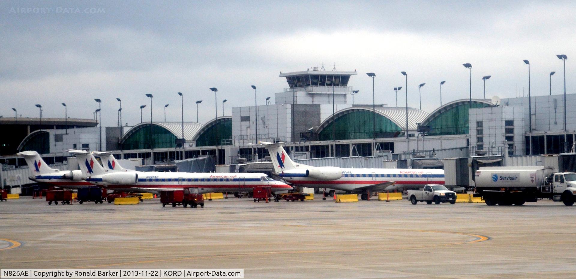N826AE, 2002 Embraer ERJ-140LR (EMB-135KL) C/N 145592, At the gate O'Hare